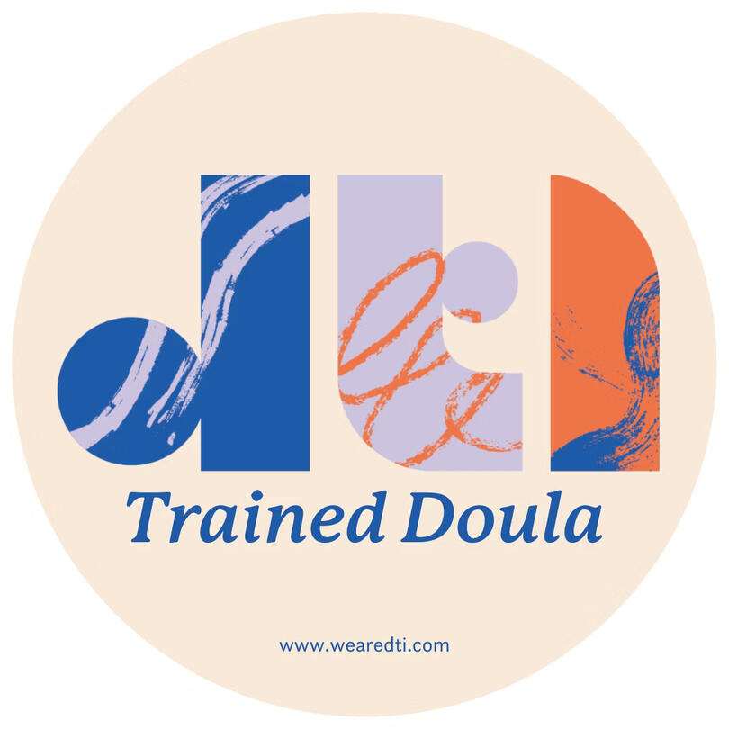 Trained doula badge An official badge that says "DTI Trained Doula" with DTI's website, www.wearedti.com, at the bottom.